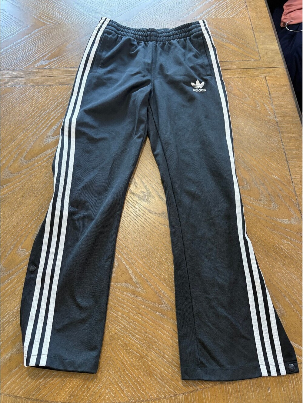 Adidas Vintage Black Track Pants with White Stripes and Snap Buttons